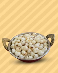 A pan holding 4 Suta Phool Makhana to show the size and texture of the fox nuts for customer reference