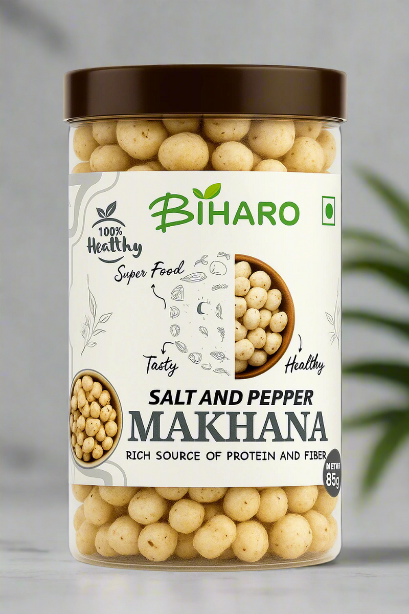 Product image of BIHARO Salt and Pepper Makhana in a transparent cylindrical jar with a dark brown lid. The jar is filled with lightly roasted lotus seeds (makhana) seasoned with visible black pepper flecks, matching the natural color tone from a real-life reference. The label features the BIHARO logo, 'Salt and Pepper Makhana' branding, and highlights like '100% Healthy', 'Super Food', and 'Rich Source of Protein and Fiber', all against a white and gray-themed background.